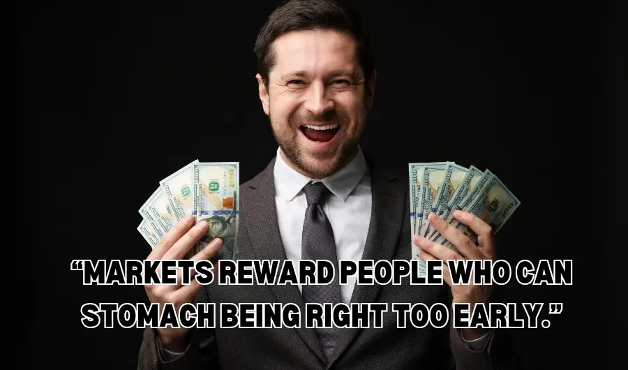 Man with dollar bills with a written investment quote